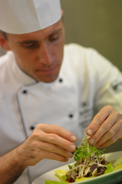Christiano De Martin adding the finishing touches to the New Summer Menu at White Restaurant, Auckland